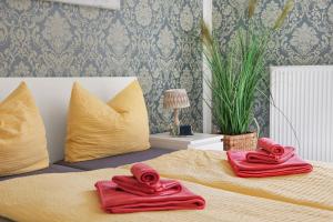 Postel nebo postele na pokoji v ubytování Loft Apartments