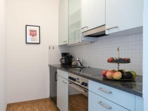 Kuchyň nebo kuchyňský kout v ubytování Apartment Double Room Modern-6 by Interhome