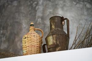 two vases sitting on top of a white shelf at Sparrow Sintra Nest in Sintra