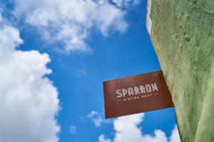 a sign on the side of a building with the sky in the background at Sparrow Sintra Nest in Sintra