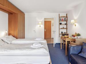 Postel nebo postele na pokoji v ubytování Apartment Promenade - Utoring-68 by Interhome