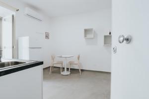 Kuchyň nebo kuchyňský kout v ubytování Noah&Chris Apartments