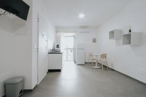 Kuchyň nebo kuchyňský kout v ubytování Noah&Chris Apartments