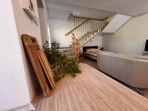 TV a/nebo společenská místnost v ubytování Domy szeregowe Klif