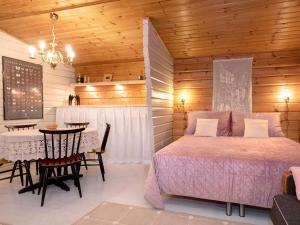 Ένα ή περισσότερα κρεβάτια σε δωμάτιο στο Holiday Home Havukka by Interhome