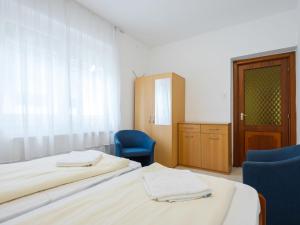 Posteľ alebo postele v izbe v ubytovaní Apartment Moni 1 by Interhome