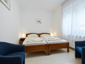Posteľ alebo postele v izbe v ubytovaní Apartment Moni 1 by Interhome