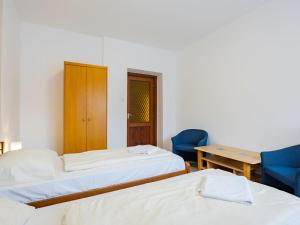 Posteľ alebo postele v izbe v ubytovaní Apartment Moni 1 by Interhome