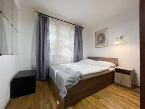 Postel nebo postele na pokoji v ubytování Holiday Home Kiwi by Interhome + 12 fotografií