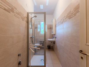 a bathroom with a shower and a sink at Apartment Condominio dei Giardini by Interhome in Bellano