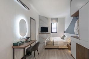 TV a/nebo společenská místnost v ubytování Saturn Hotel