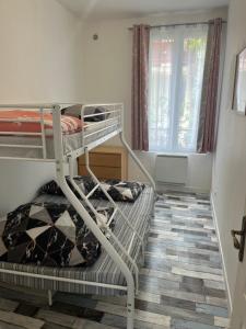 Ein Bett oder Betten in einem Zimmer der Unterkunft Good Paris Roissy CDG