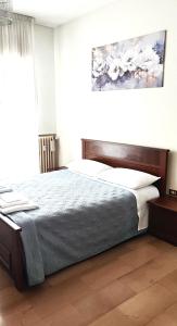 Postel nebo postele na pokoji v ubytování Monte Generoso + 6 fotografií