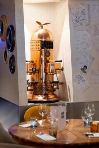 a coffee machine sitting on top of a table at Rouvenaz Appartements in Montreux +39 photos