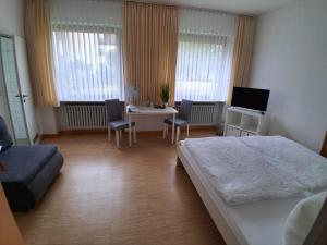 Postel nebo postele na pokoji v ubytování Klosterhof Neustadt am Main