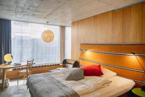 Llit o llits en una habitació de Nomad Design & Lifestyle Hotel 30 fotos més