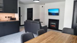 Kuchyň nebo kuchyňský kout v ubytování Monkey Puzzle Apartment No1