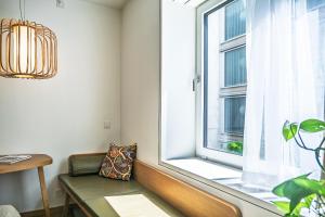 Khu vực ghế ngồi tại Nomad Design & Lifestyle Hotel