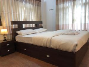 Un ou plusieurs lits dans un hébergement de l'établissement Apartment in Nepal