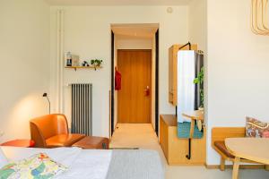 Giường trong phòng chung tại Nomad Design & Lifestyle Hotel