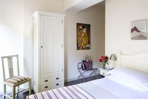 A bed or beds in a room at Hotel San Pietro