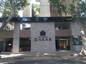 aania dakar sign on the side of a building at Gran Hotel Dakar in Mendoza