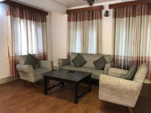 Coin salon dans l'établissement Apartment in Nepal