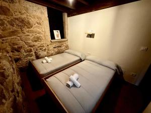 Posteľ alebo postele v izbe v ubytovaní A de Pepita, Turismo Rural en Padrón by URent
