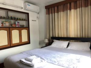Un ou plusieurs lits dans un hébergement de l'établissement Apartment in Nepal