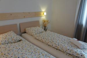 Postel nebo postele na pokoji v ubytování B&B Alpenrösli