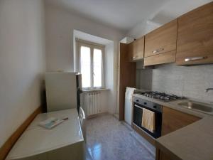 Kuchyň nebo kuchyňský kout v ubytování Le SORELLE ALLOGGIO TURISTICO + 6 fotografií