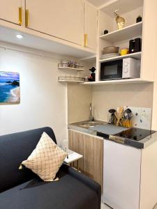 Dapur atau dapur kecil di Promenade & Beach