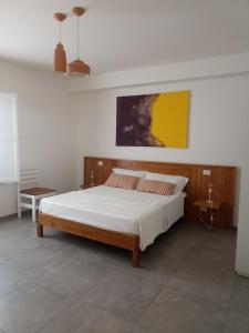 Postel nebo postele na pokoji v ubytování A est b&b Otranto
