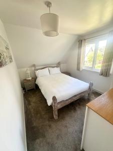 Ένα ή περισσότερα κρεβάτια σε δωμάτιο στο Charming & Spacious Holiday Home
