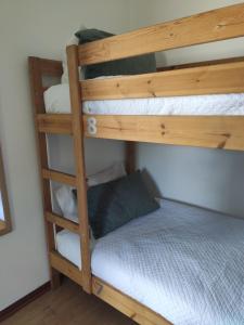 Cama ou camas em um quarto em Old Village Hostel