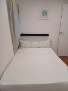 Postel nebo postele na pokoji v ubytování Valencia tranvia Beach malvarrosa