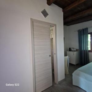 A bed or beds in a room at Il Siriaco