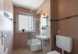 Ένα μπάνιο στο Berlin Central Premium Apartments for Groups +144 φωτογραφίες