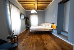 Postel nebo postele na pokoji v ubytování Casa Suntina + 13 fotografií