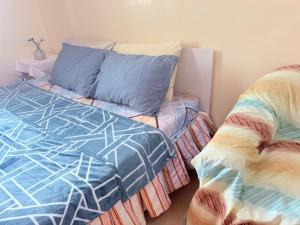 Letto o letti in una camera di BlessyWail Homestay