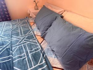 Letto o letti in una camera di BlessyWail Homestay