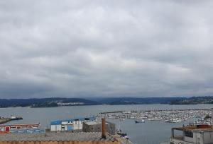 a view of a harbor with boats in the water at Casita en Fontán in Sada +41 photos