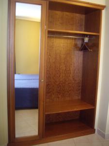 Łóżko lub łóżka w pokoju w obiekcie Hotel Manolo Mayo