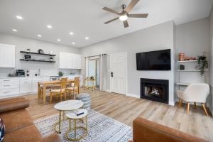 a living room with a couch and a fireplace at Old Town Southwest Style 2BR Condo with Pool and Hot Tub in Scottsdale