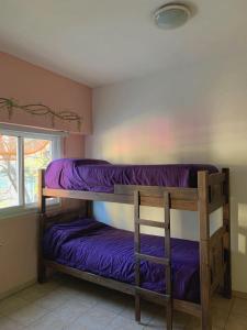 Postelja oz. postelje v sobi nastanitve Go Hostel