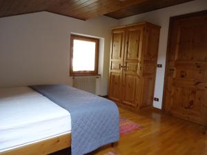 Posteľ alebo postele v izbe v ubytovaní Casa Martinelli - Trameri