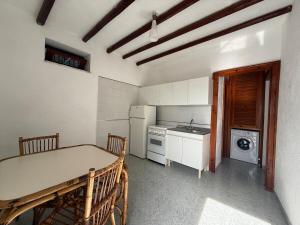 Η κουζίνα ή μικρή κουζίνα στο House La Pennata - sea view