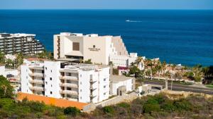 an aerial view of a resort near the ocean at Group Apt 13 16, no view, 3BR, 12 pax in Cabo San Lucas