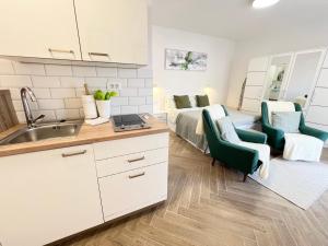 Η κουζίνα ή μικρή κουζίνα στο KING RESIDENCE OLD TOWN RAB 2 - Adults Only