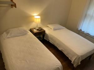 Postel nebo postele na pokoji v ubytování Cappuccio Hotel